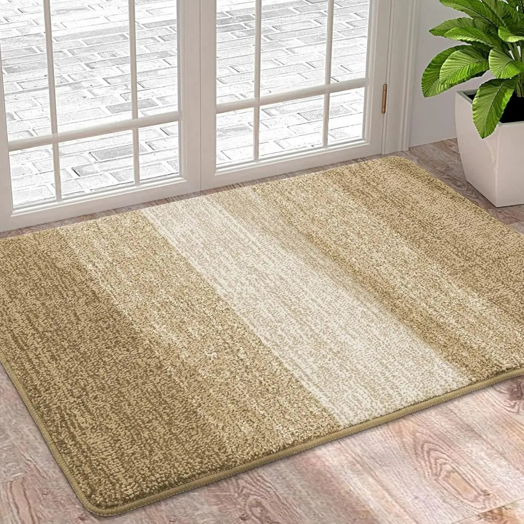 Washable floor mat for entrances with water-absorbing design