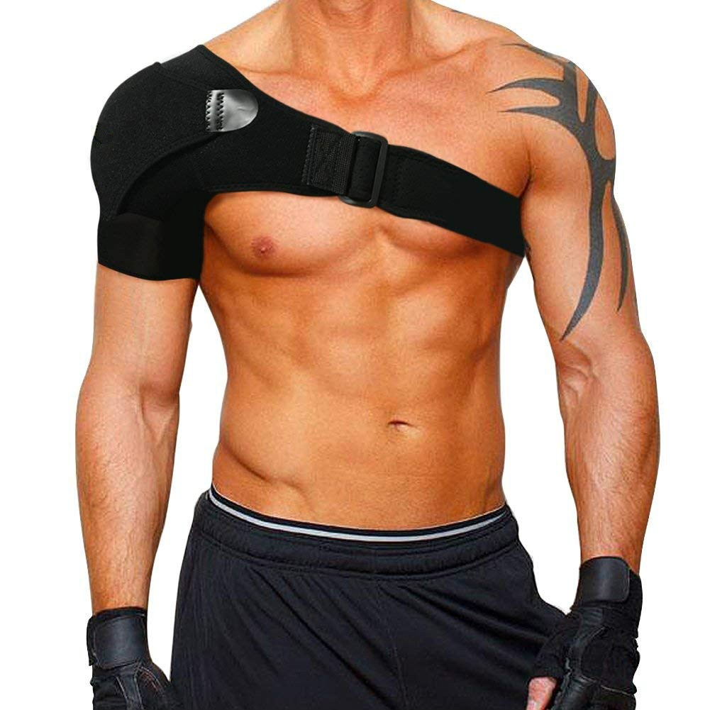 Shoulder orthosis with compression pad