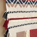 Handwoven geometric pattern tassel wall hanging