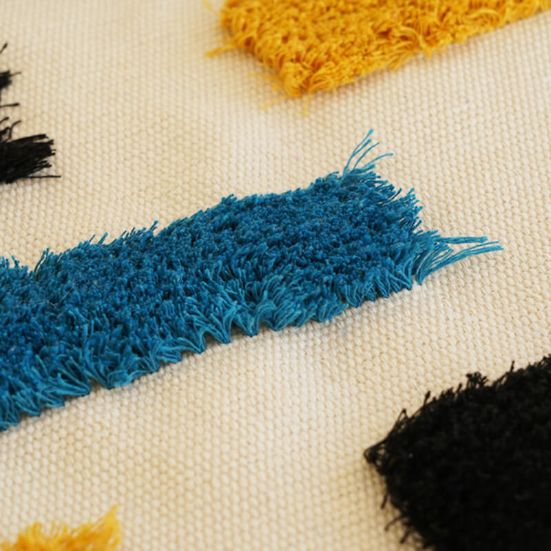 Handwoven geometric pattern tassel wall hanging