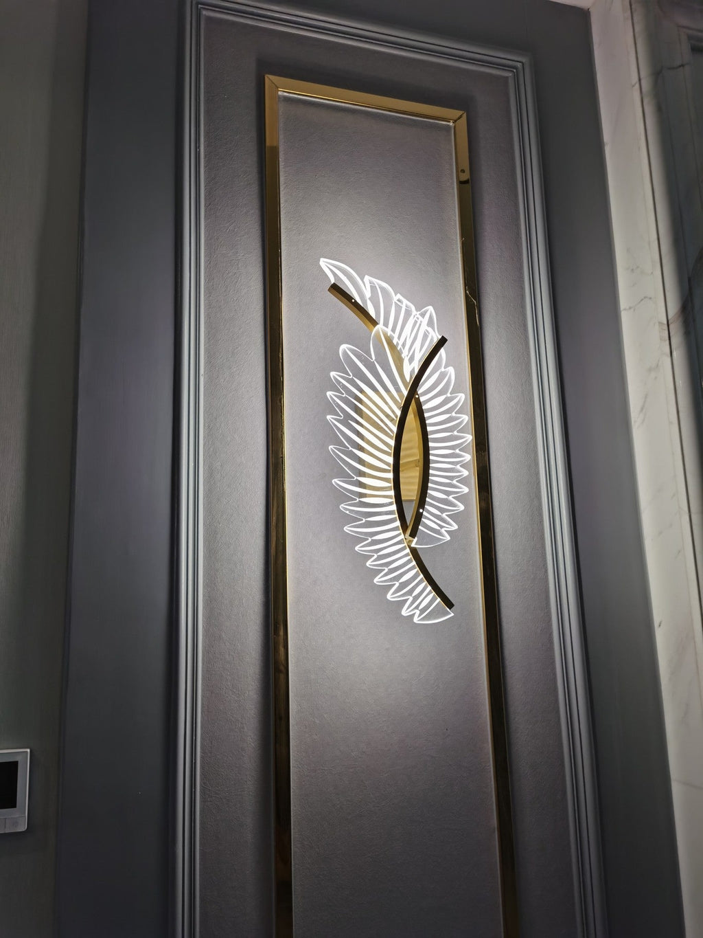 Wall Lamp with Nature-Inspired Golden Wing Motif
