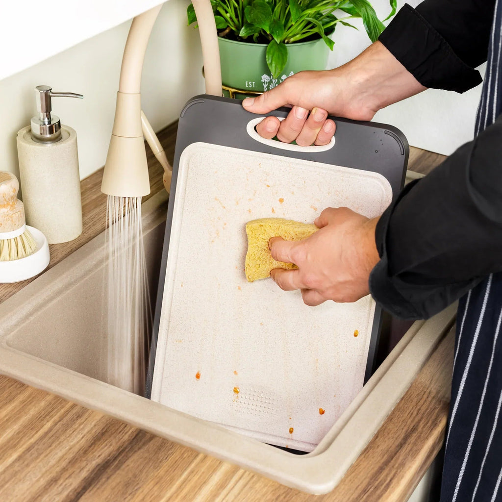 Hygienic stainless steel cutting board with non-slip handle for precise cutting