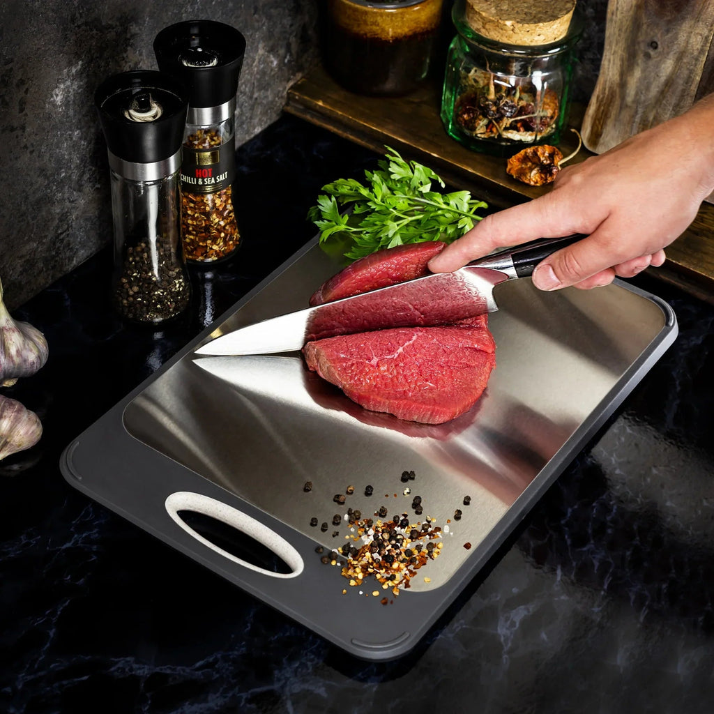 Hygienic stainless steel cutting board with non-slip handle for precise cutting
