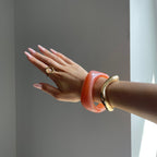 Gold bracelet in orange – A stylish accent for modern looks