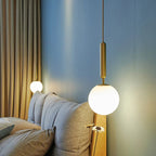 Luxurious pendant lamp in gold – Modern hanging light for staircase or living area
