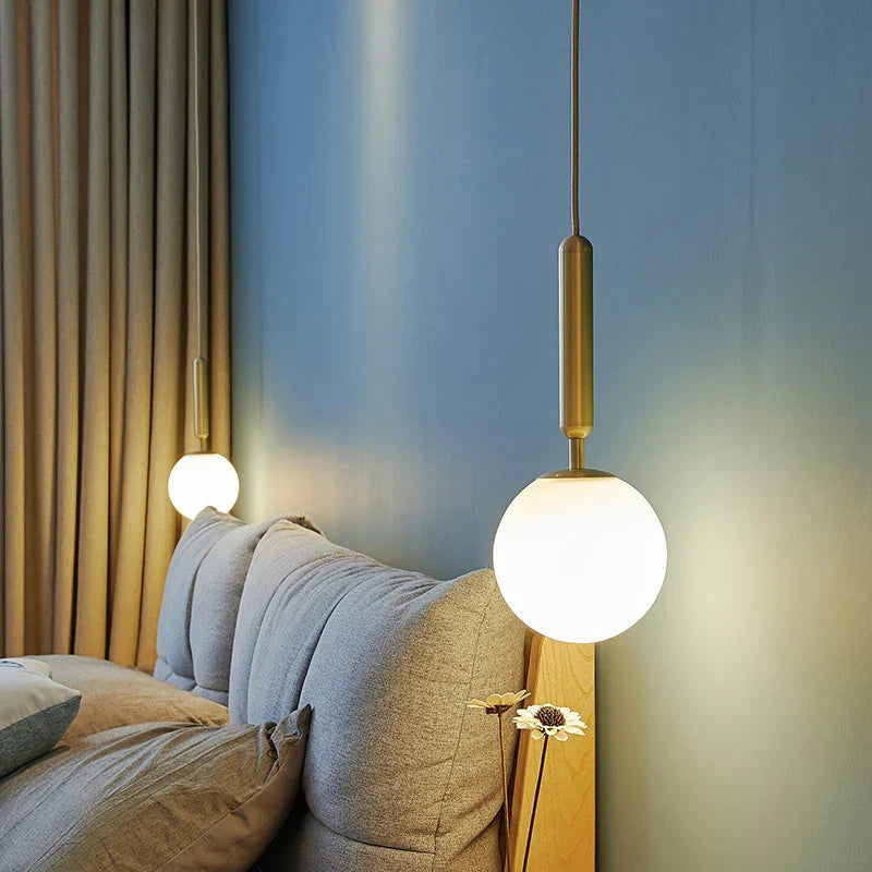 Luxurious pendant lamp in gold – Modern hanging light for staircase or living area