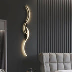 Modern curved LED wall lamp for atmospheric lighting