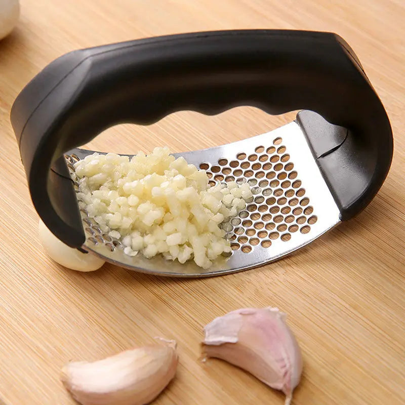 Durable garlic press made of stainless steel for effortless crushing