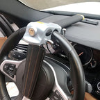 Steering wheel lock with alarm function and triple security