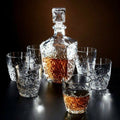 Luxury whiskey decanter with elegant glasses