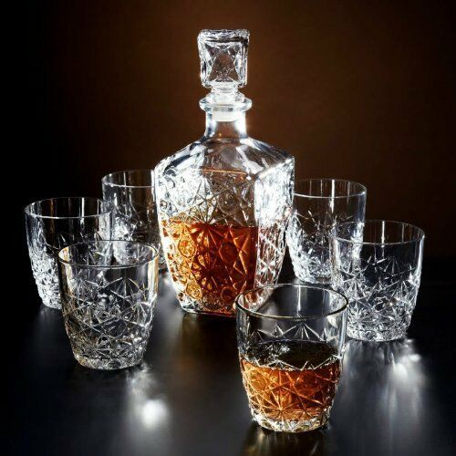 Luxury whiskey decanter with elegant glasses