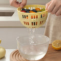 Manual fruit and vegetable spin dryer with removable container