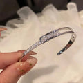 Open bracelet made of 925 sterling silver with zirconia