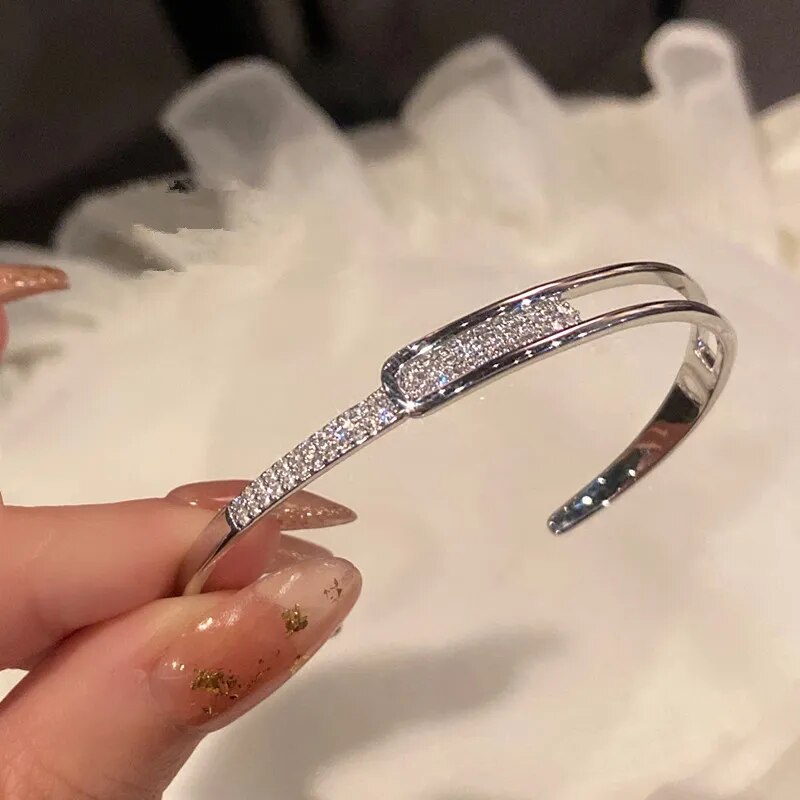 Open bracelet made of 925 sterling silver with zirconia