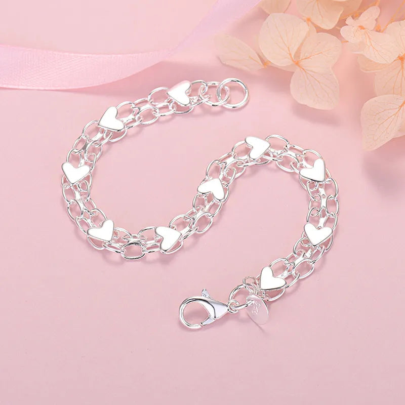 Elegant Luxury Silver Heart Bracelet – Timeless and Chic