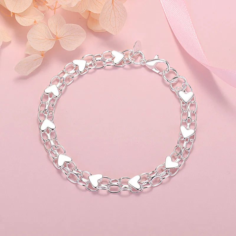 Elegant Luxury Silver Heart Bracelet – Timeless and Chic