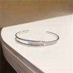 Open bracelet made of 925 sterling silver with zirconia