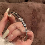 Open bracelet made of 925 sterling silver with zirconia