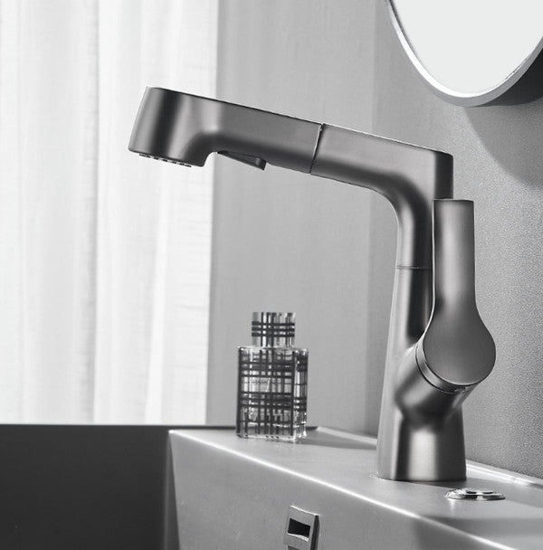 Bathroom fixture with rotating retractable hand shower