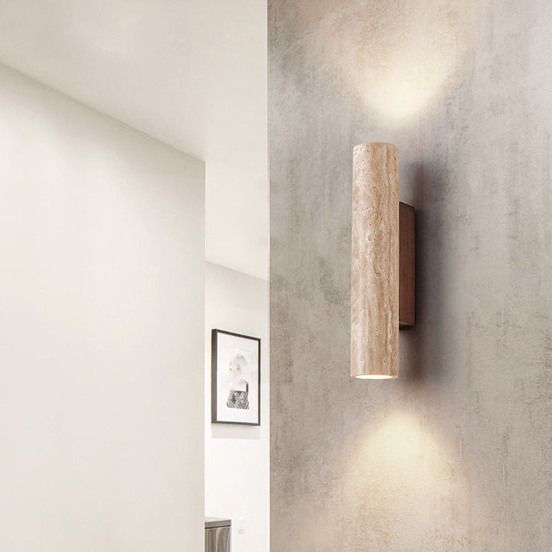 Travertine wall lamp in Japandi tube shape