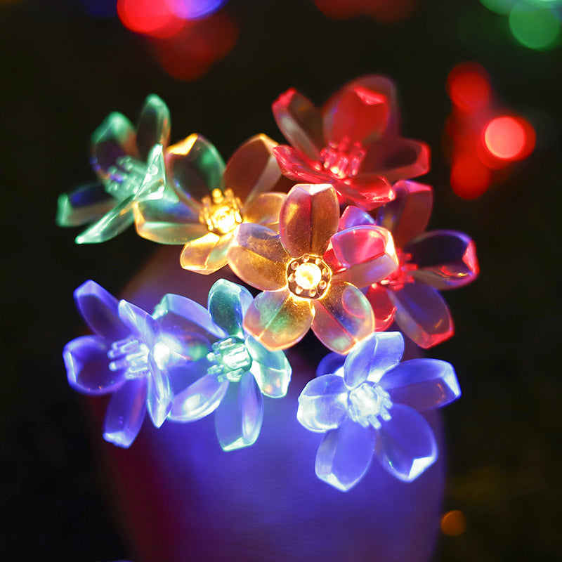 Solar flower light chain for the garden