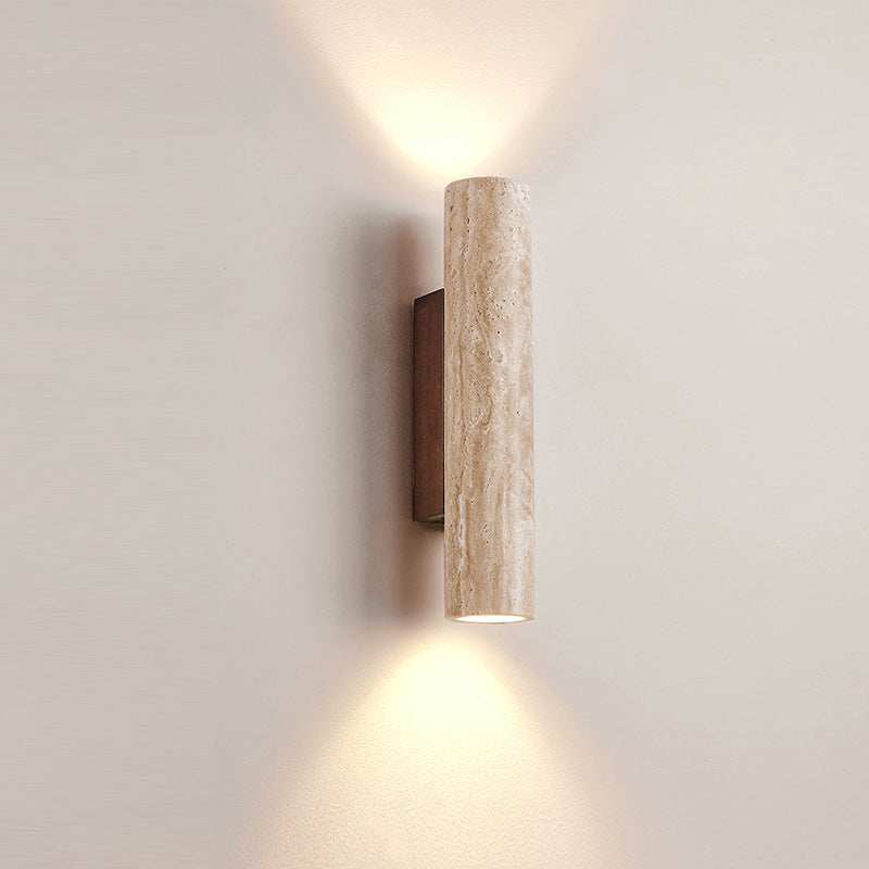 Travertine wall lamp in Japandi tube shape