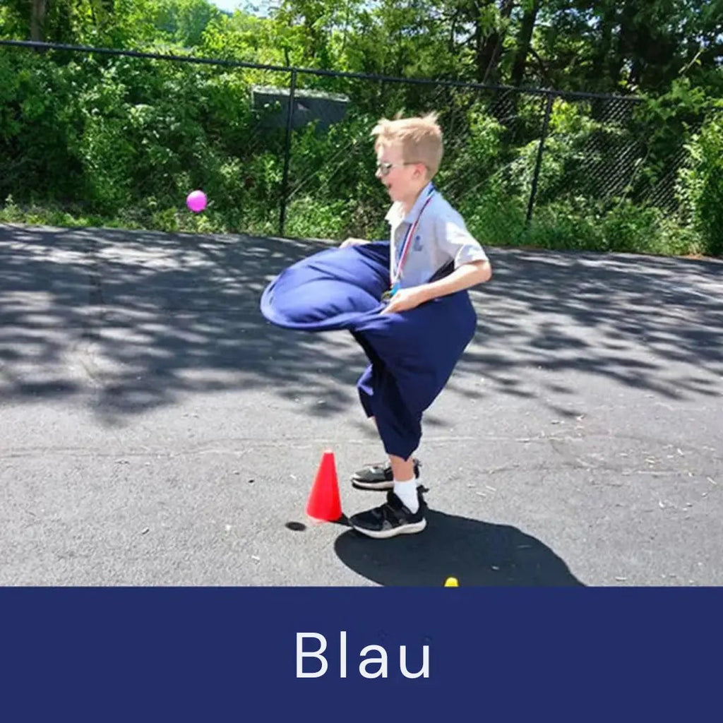 Outdoor-catch game with giant pants for group fun