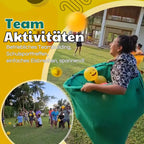 Outdoor-catch game with giant pants for group fun