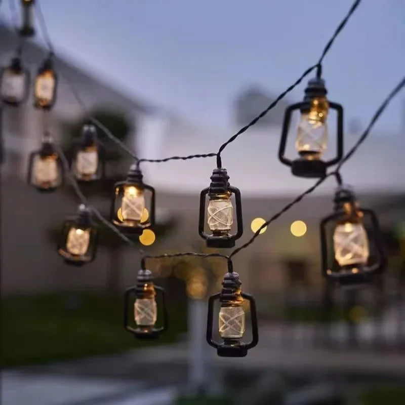 Solar-powered LED string lights with flame effect – Decorative outdoor lighting for garden and terrace