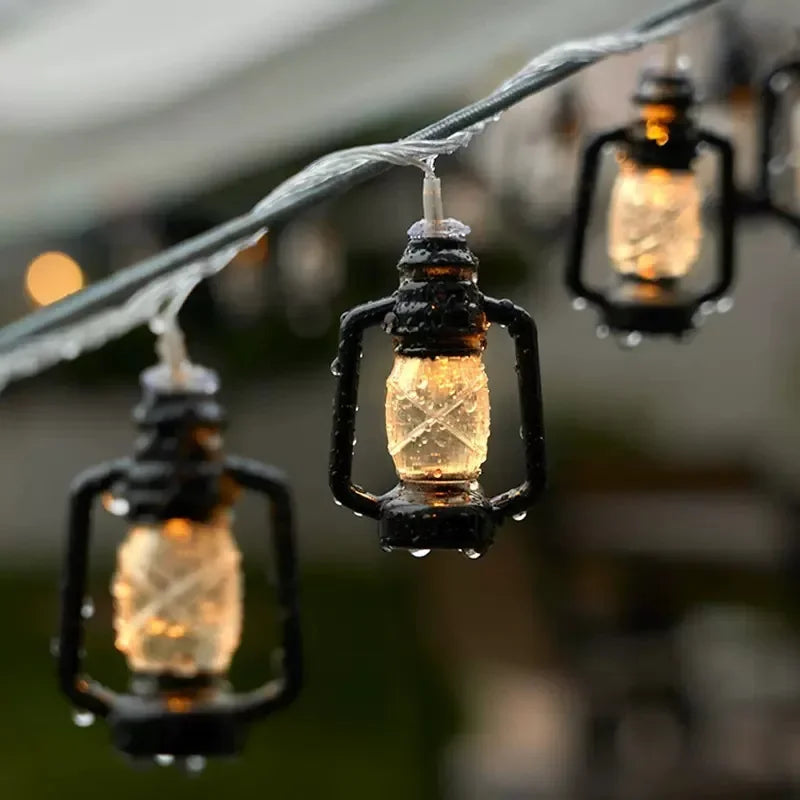 Solar-powered LED string lights with flame effect – Decorative outdoor lighting for garden and terrace