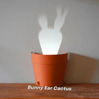 Plant pot with 7 light projections for wall decor
