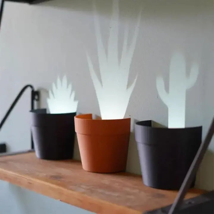Plant pot with 7 light projections for wall decor