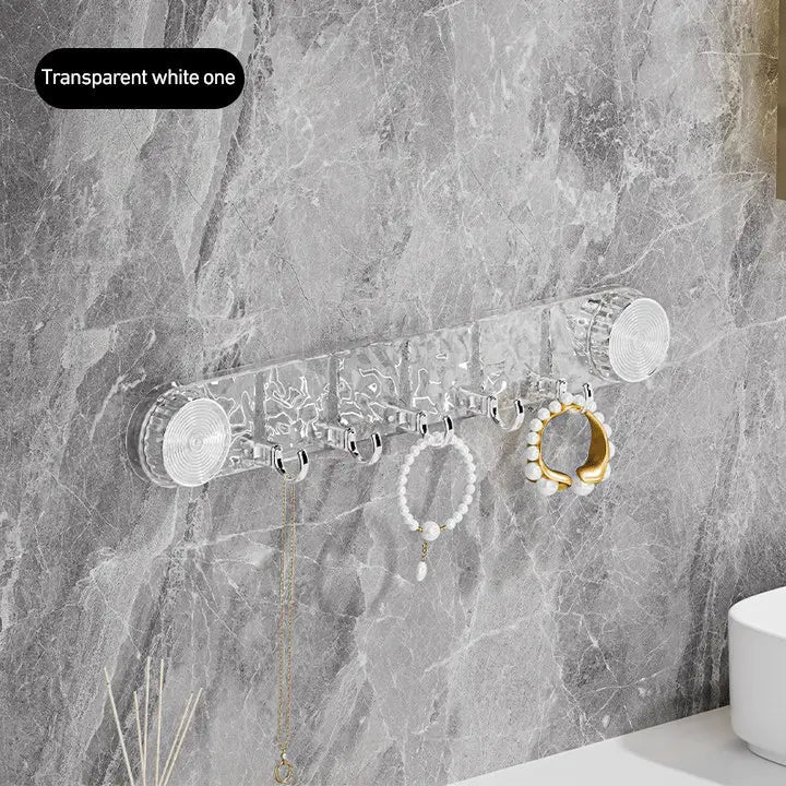 Space-saving suction cup hooks with adjustable folding design