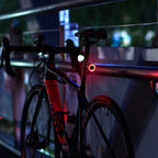 Slim bike taillight with automatic brake sensor and light detection