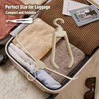 Robust foldable clothes hanger with one-button function and crease pRedection
