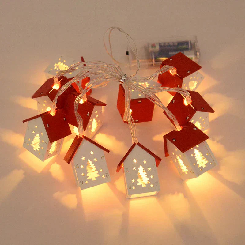 Wooden Christmas houses with LED lighting for festive decoration