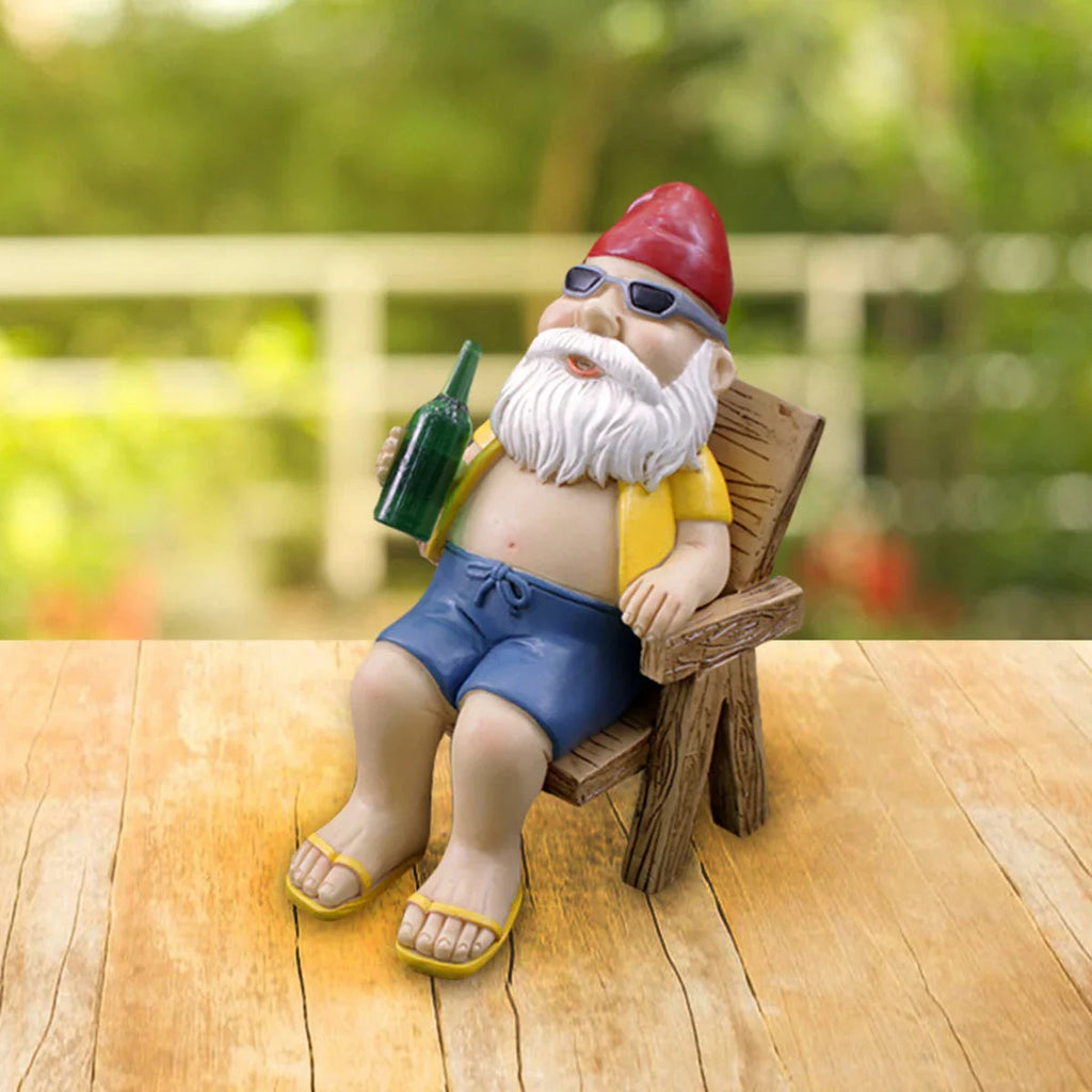 Sunbathing Gnome Statue made of Resin with Lounger for Garden Decoration