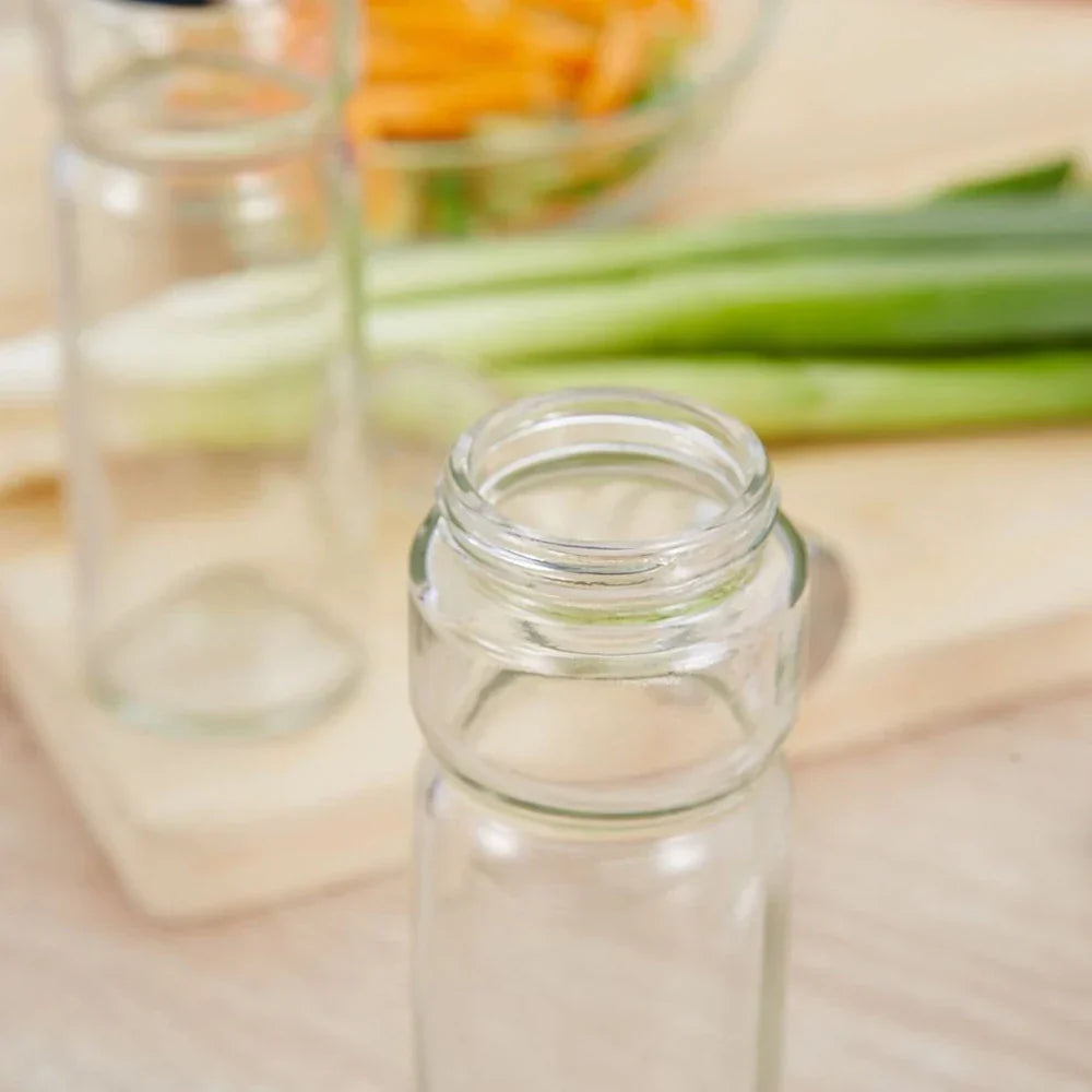 Classic set of bottles and shakers for spices with convenient stands