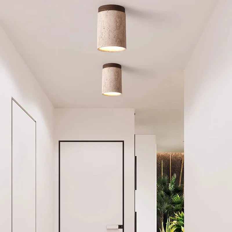 Built-in lustre made of travertine for entrance area and staircase