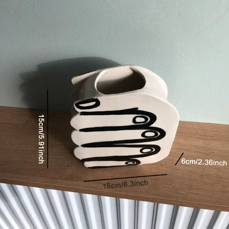 Hand Holding Flowers Vase
