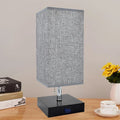 Subtle bedside lamp with elegant light and USB