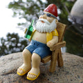 Sunbathing Gnome Statue made of Resin with Lounger for Garden Decoration
