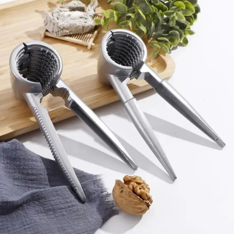 Nutoro Nutcracker made of metal | Multifunctional for walnuts, chestnuts, almonds & hazelnuts | Ergonomic handle | Silver
