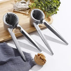 Nutoro Nutcracker made of metal | Multifunctional for walnuts, chestnuts, almonds & hazelnuts | Ergonomic handle | Silver
