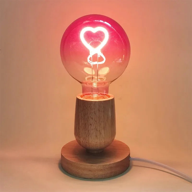 Pink LED light bulb with heart pattern – gradient