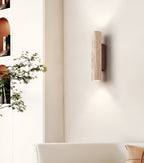 Travertine wall lamp in Japandi tube shape
