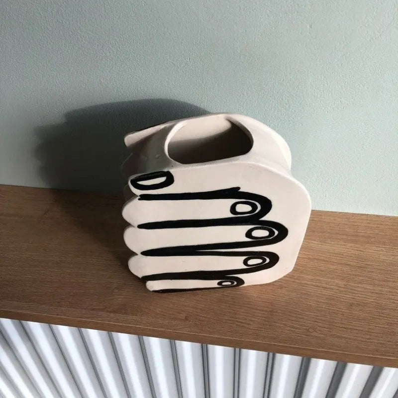 Hand Holding Flowers Vase