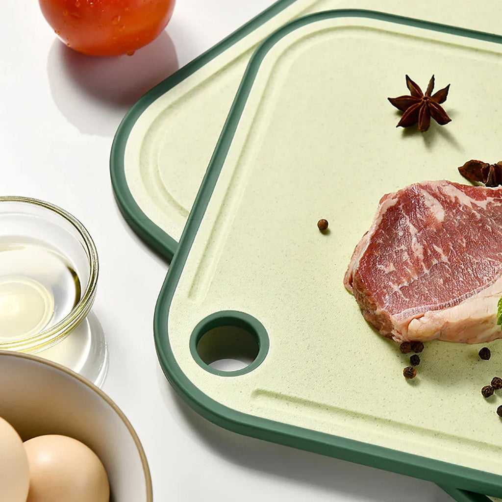 Practical cutting board with garlic mill