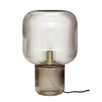 Stylish lamp with a noble finish