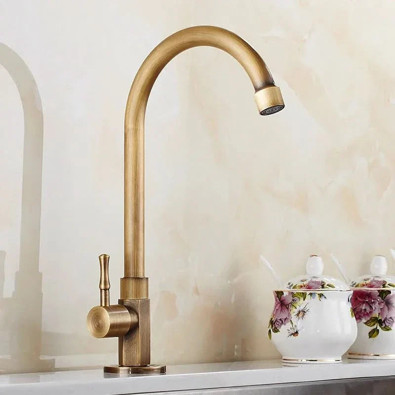 Antique faucet in a swan neck design for kitchen & garden